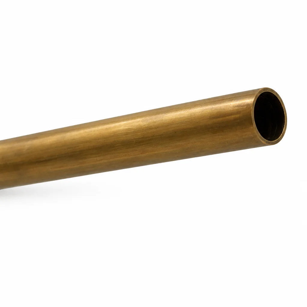 Bronze metal tube on a white background