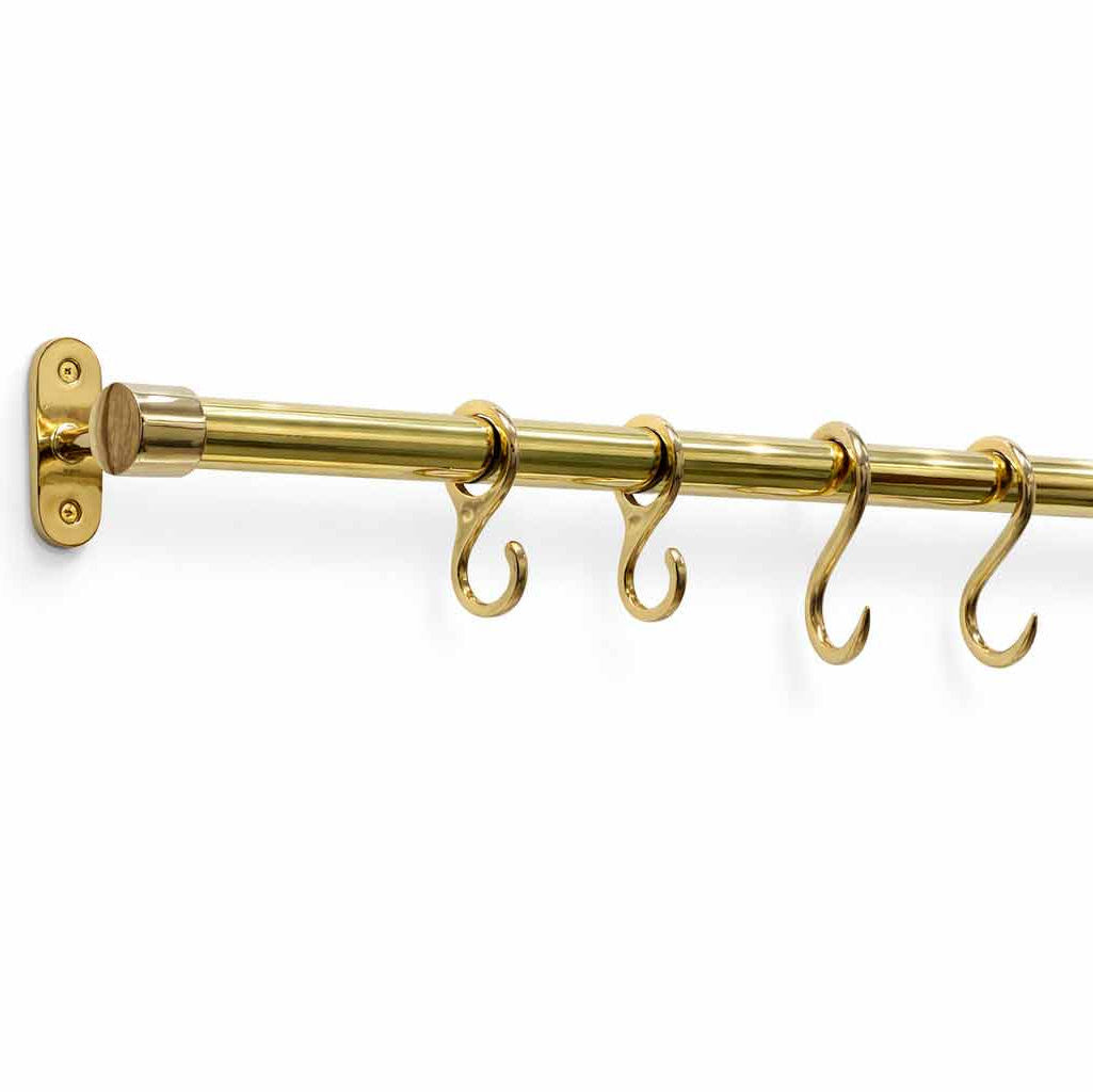 Brass pot rail rod with hooks on a white background