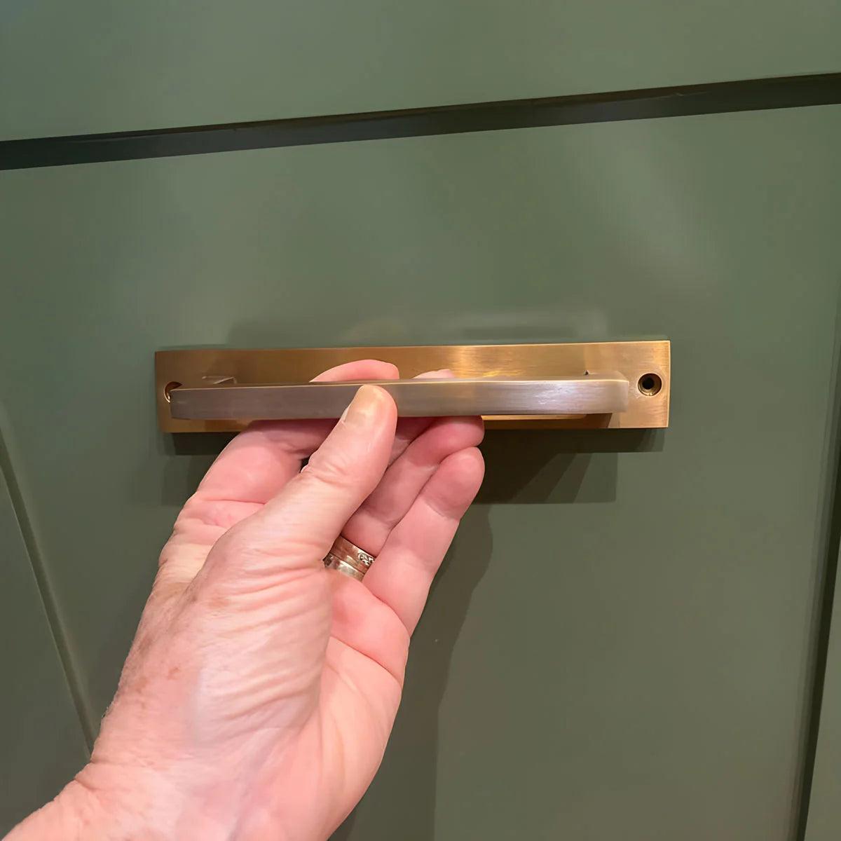 Choosing A Winning Combination: Perfecting The Cabinetry Backdrop Colors To Match Brass Hardware - Stylentdecor